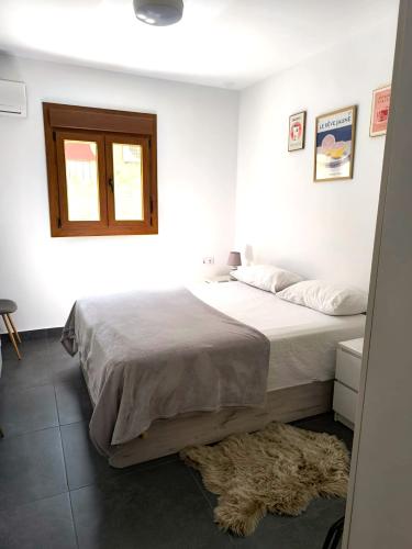 Dormitorio cama matrimonio