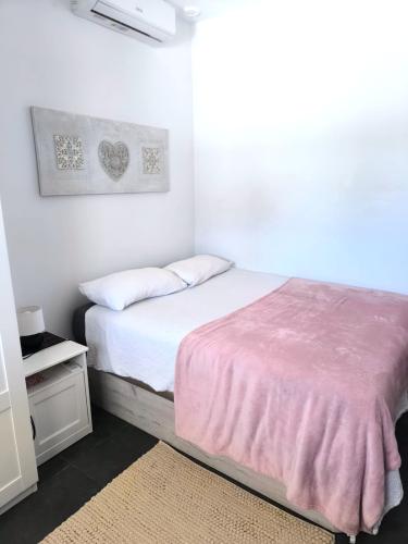 Dormitorio cama rosa