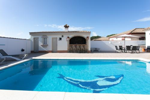 Piscina con la barbacoa